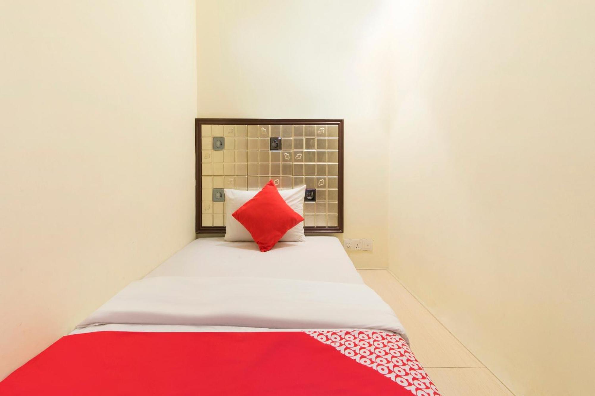 Oyo 90894 Smc I-city Hotel