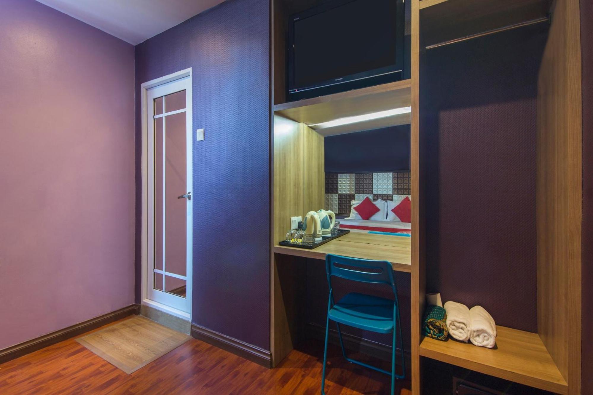 Oyo 90894 Smc I-city Hotel